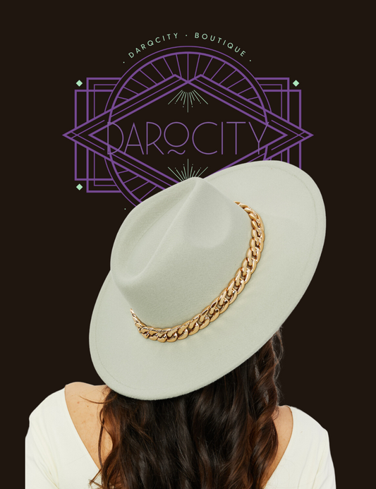 "Vintage Mint" Fedora w/Chunky Chain by Fame as worn by a model in the color option mint.