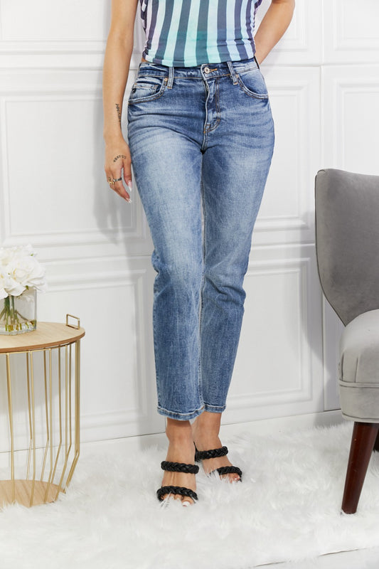 Make a timeless statement with Kancan jeans. These classic, high-rise slim-straight jeans are constructed with 98% cotton and 2% spandex for a comfortable fit that lasts. Their vintage-inspired wash and clean look make them a contemporary classic.
